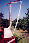 birdnetting applicator drapeover cherries vineyard